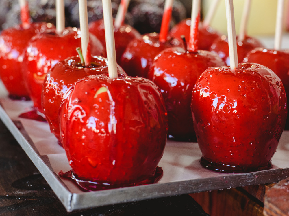 A tray of candy apples drying