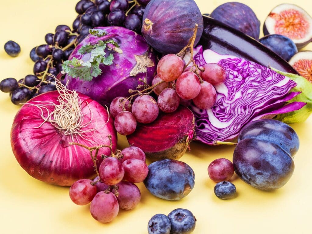 A variety of purple fruits and vegetables