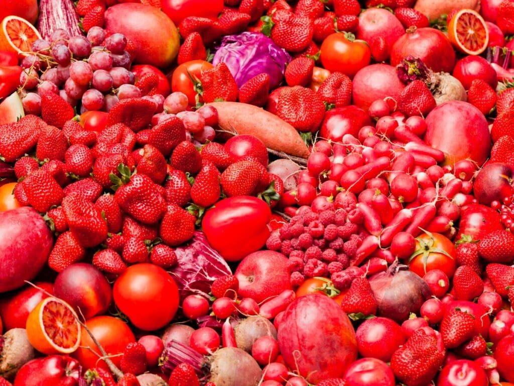 A variety of red fruits and vegetables