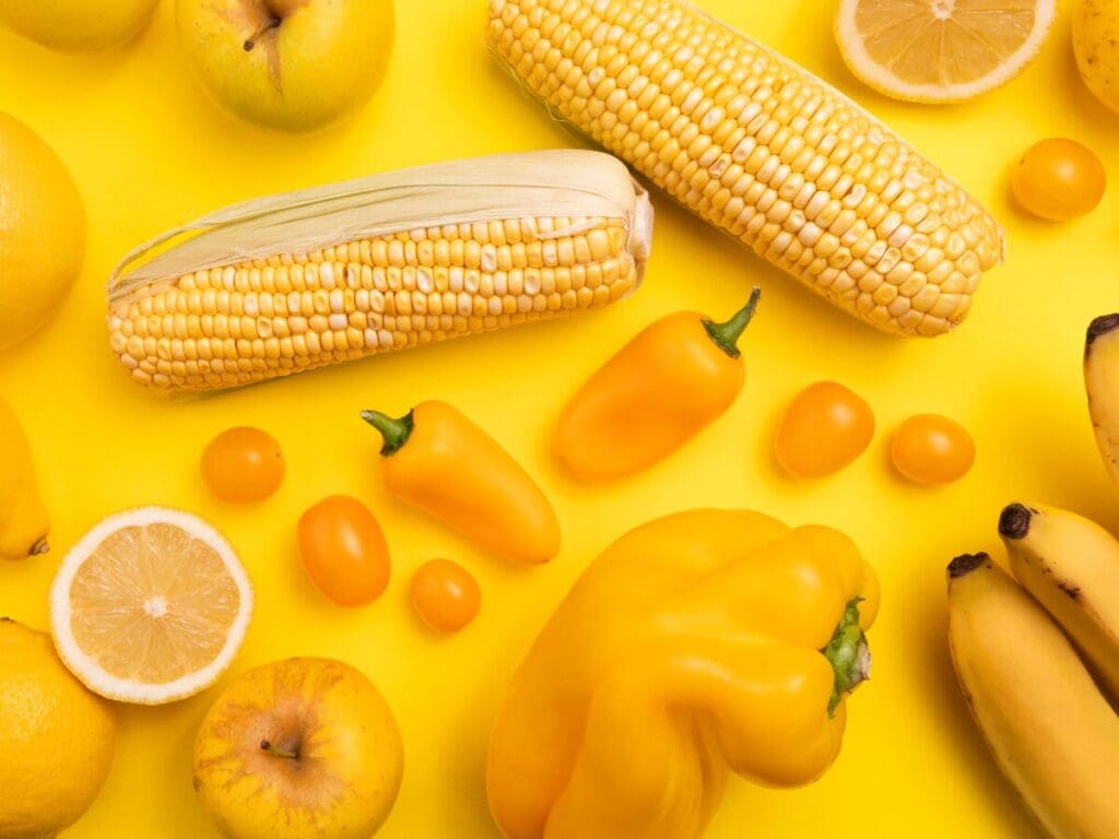 A variety of yellow fruits and vegetables